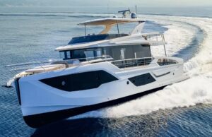 Reupholstering Boat Seat Gives Boats a Fresh New Look White luxury motor yacht cruising at speed through blue water, creating a white wake behind it.