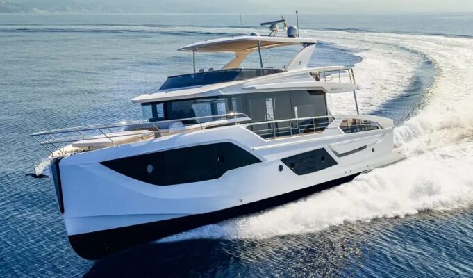 Reupholstering Boat Seat Gives Boats a Fresh New Look White luxury motor yacht cruising at speed through blue water, creating a white wake behind it.